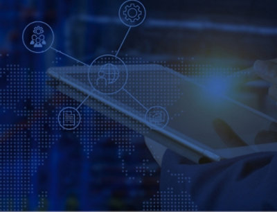 A close-up of a hand holding a tablet against a blue and white background with dots.