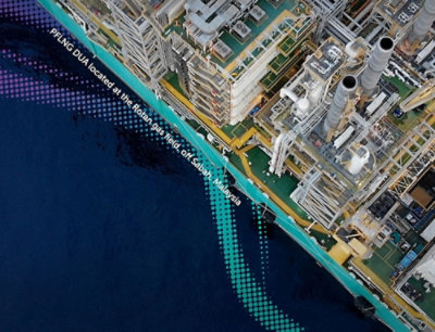 An aerial view of a factory with buildings and structures visible.