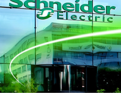 A building with a green sign reading Schneider Electric.