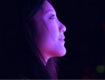 A persons face appearing pink