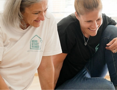 A logo on a white surface displaying the text HEAD START HOMES.