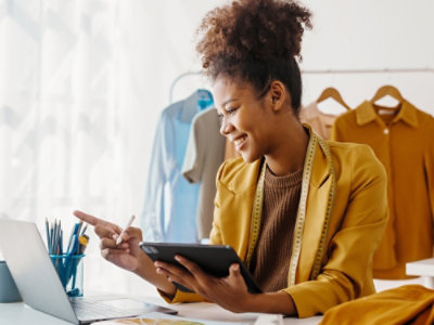A woman using tablet.