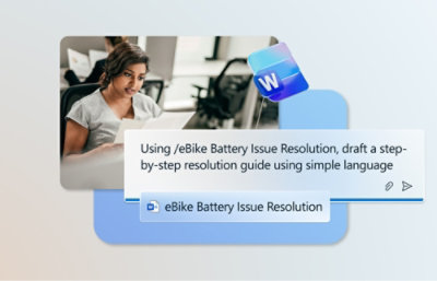 A woman looking at a computer screen displaying a step-by-step guide on eBike battery issue resolution.