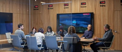 A group of people sitting at a table.