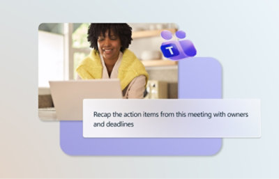 一位围着黄色围巾的女子正看着笔记本电脑。