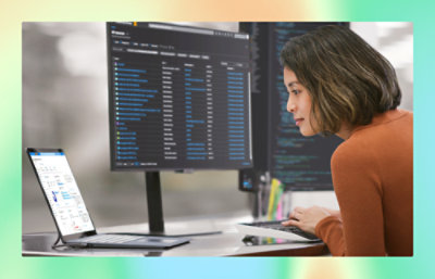 A women looking into laptop screen.