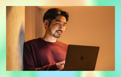 A man working in a laptop.