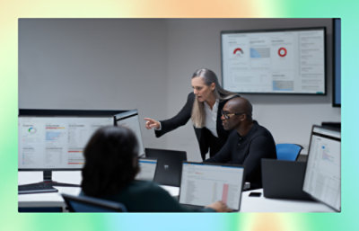 A women showing smothing on a scrren to a man.