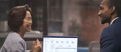 A person sitting in front of a computer.