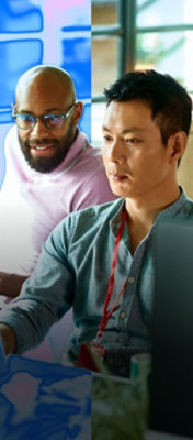 Two person looking at the desktop