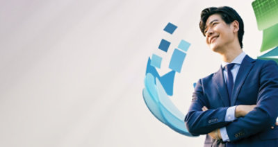 A man in a suit with his arms crossed.