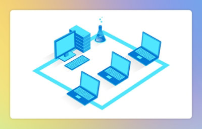 A person sitting at a desk with a laptop and multiple monitors.