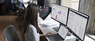 A woman working on a computer.