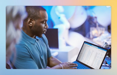 A person using a laptop.