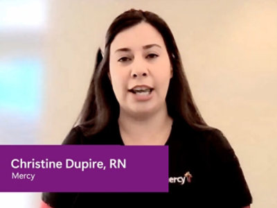 Nurse speaking on camera with name caption