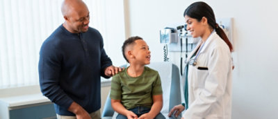 Pediatric checkup with caregiver present