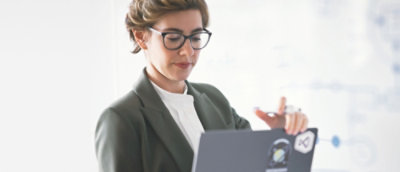 A woman looking into laptop