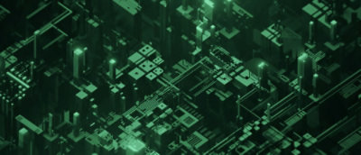 A close-up of a green circuit board with various components.