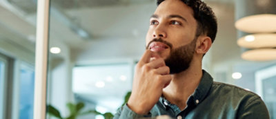 A man smiling and looking somewhere