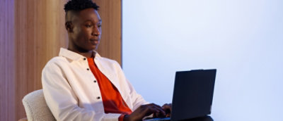 A person using a laptop.