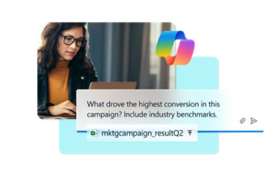 A woman looking at her laptop.