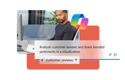 A man using a tablet sitting on the couch.