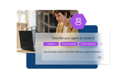 A woman sitting at a desk with a laptop working on a project.