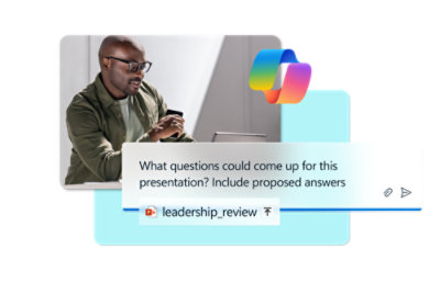 A man sitting in front of his laptop.