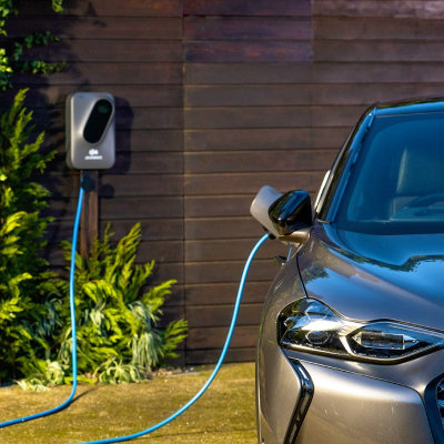An electric car plugged in and charging.
