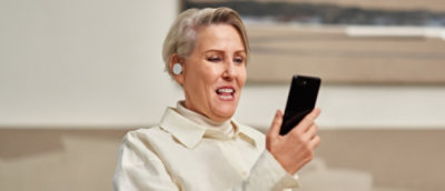 A women speaking on video call in mobile.