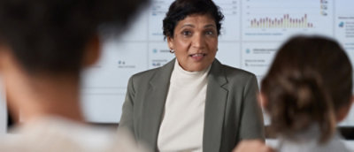 A group of people talking with eatch other.