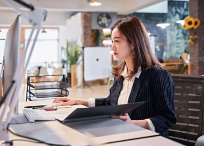 A women working on laptop.