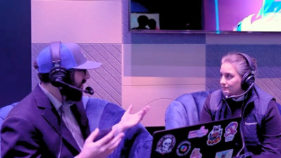 A man and woman sitting in chairs.