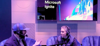 A man and woman sitting in chairs.