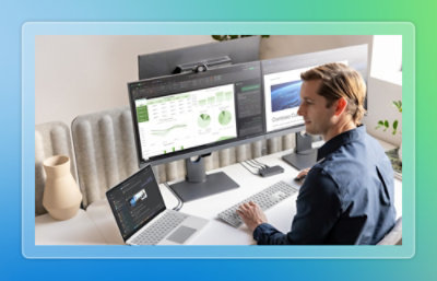 A man sitting at a desk with a computer.