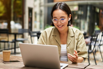 A women working on a laptop.