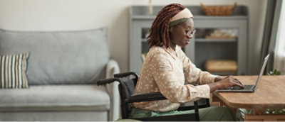 A women working on laptop.