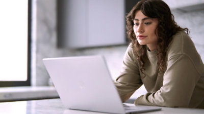 Person using a laptop on a desk