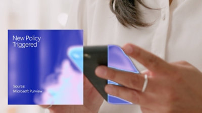 Mobile screen showing new policy alert from Microsoft Purview
