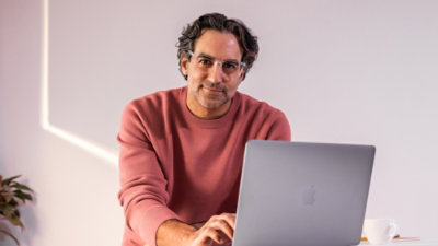 Person using a laptop at a desk