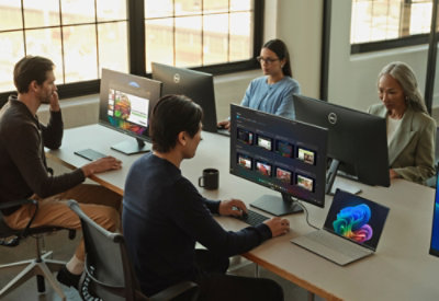 A group of people working on computers.
