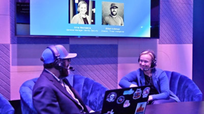 A man and woman sitting in chairs.