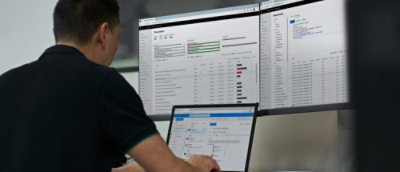 A person using a laptop.