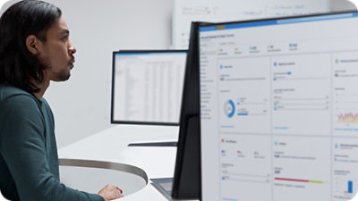 A man looking at a computer screen.