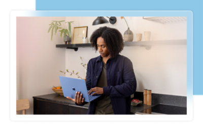 A person holding a computer