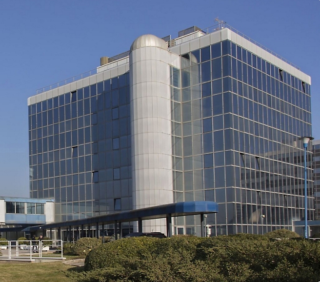 A large building with glass windows