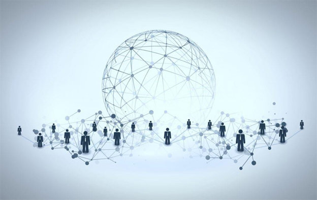 A group of people around a sphere