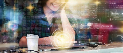 A person talking on a phone, surrounded by glowing digital icons and data charts in the background