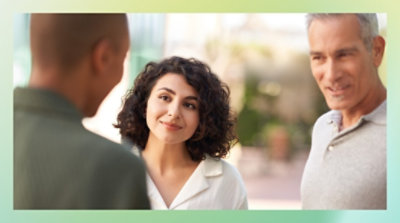 Three people having a conversation.