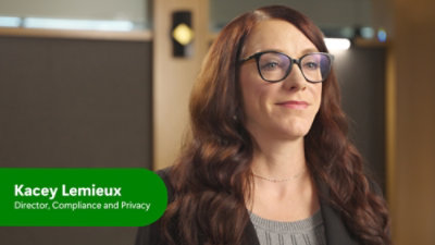 A women with long hair wearing glasses